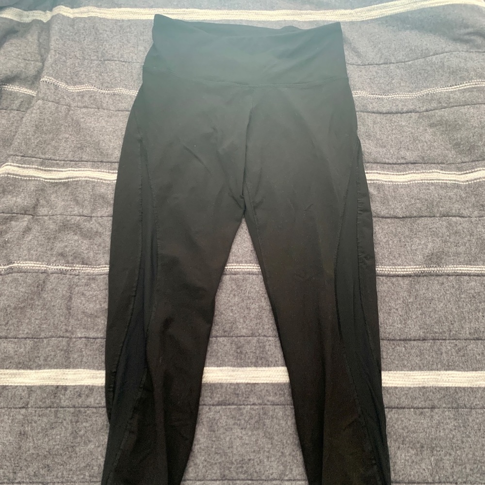 Black athletic leggings w/ sheer cut-out on side
